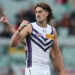 Bombshell report claims Freo star to hunt commerce, league responds as audio reveals umps lied over Schultz incident