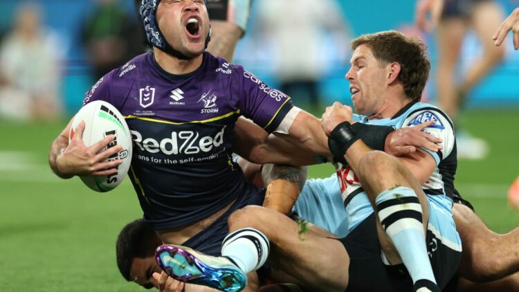 Hughes’ enormous effort with damaged arm propels Storm into grand ultimate as Sharks fall quick but once more
